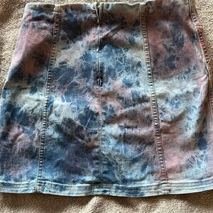 tye dye denim skirt, with blue and pink in the dye die.